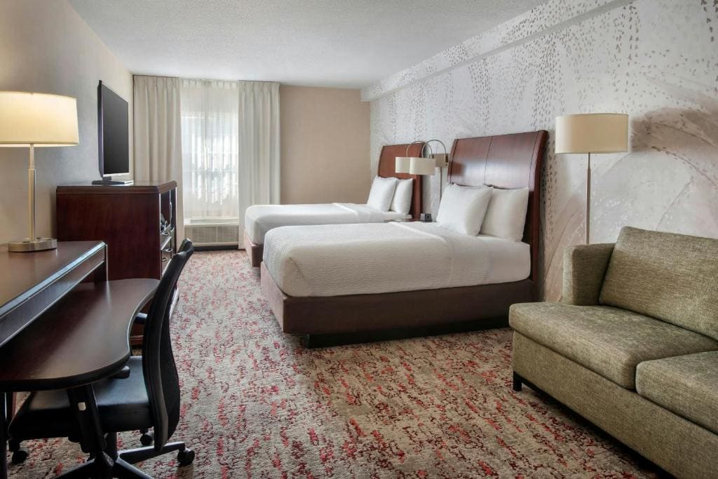 Studio with Two Queen Beds and Sofa Bed room - Image 1