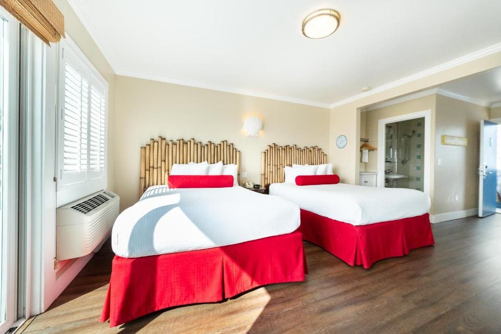 Deluxe Queen Room with Two Queen Beds and Ocean View room - Image 2