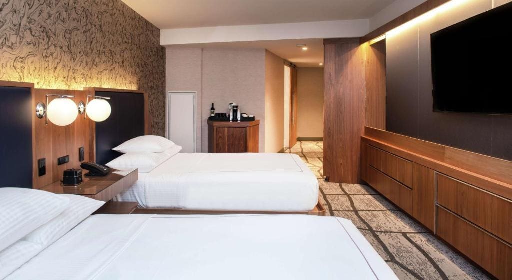 Deluxe Queen Room with Two Queen Beds and City View room - Image 1