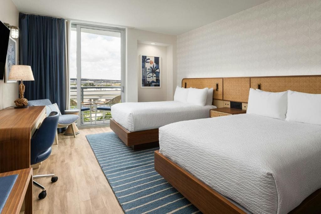 Standard Queen Room with Two Queen Beds and Balcony room - Image 1