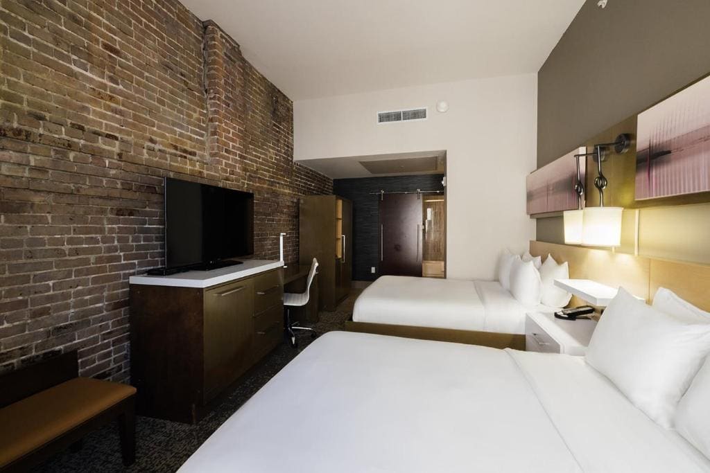 Premium Queen Room with Two Queen Beds room - Image 2