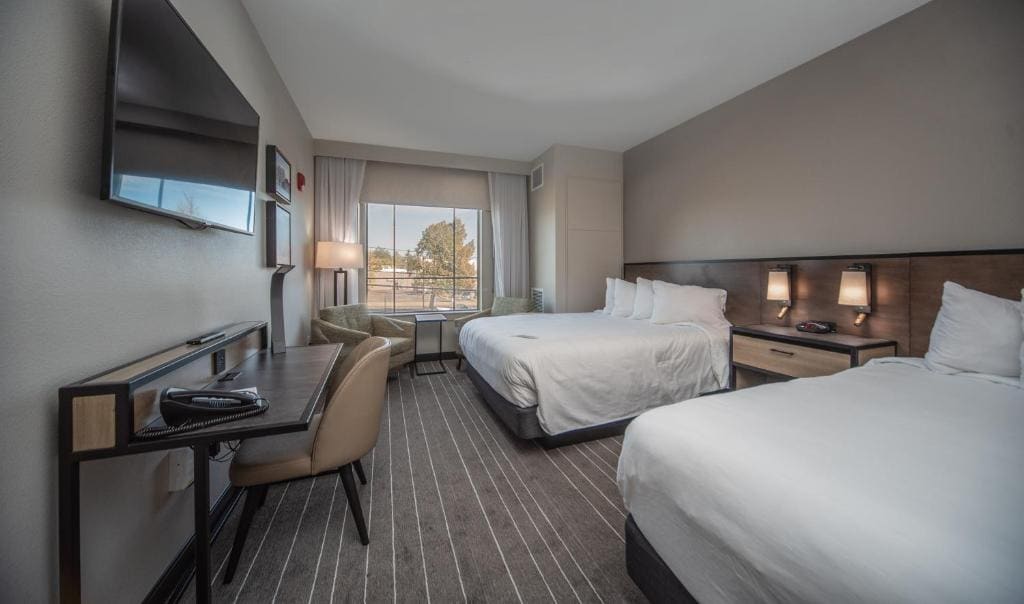 Deluxe Queen Room with Two Queen Beds room - Image 1