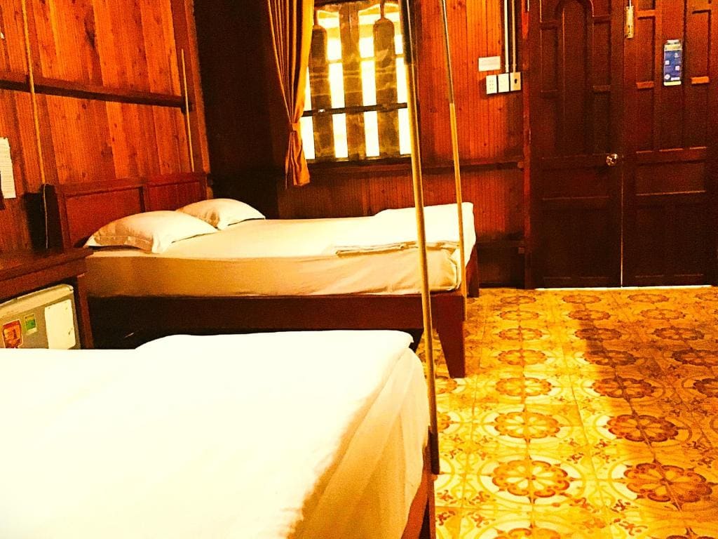 Deluxe Queen Room with Two Queen Beds room - Image 1