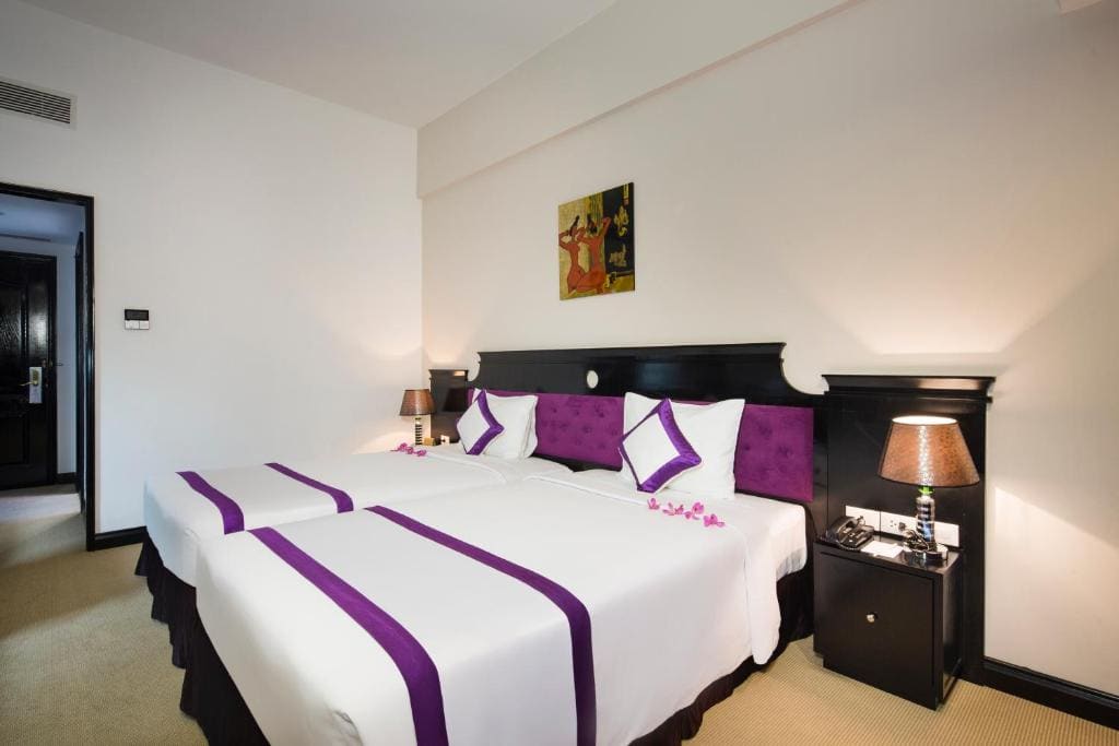 Deluxe Twin Room with Balcony and River View room - Image 1