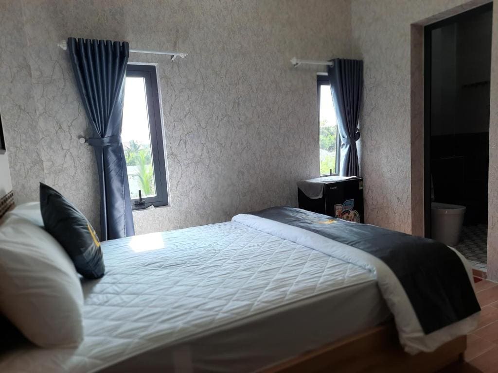 Deluxe Double Room (2 Adults + 1 Child) room - Image 1