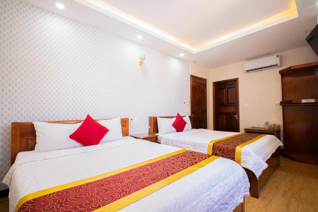 Deluxe Queen Room with Two Queen Beds room - Image 2