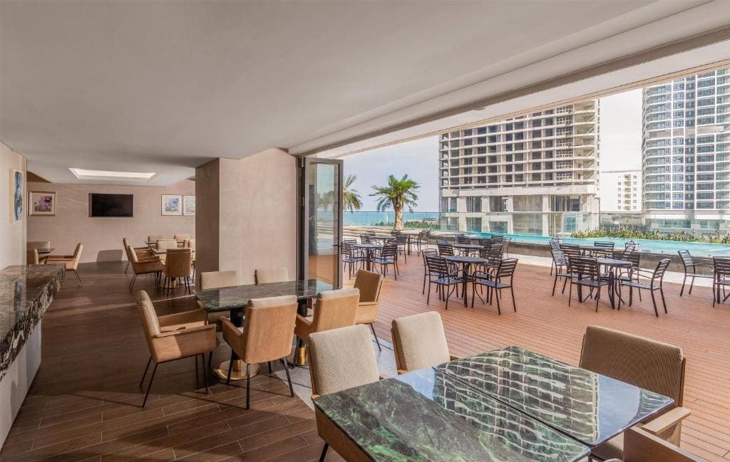 Deluxe Family One-Bedroom Suitewith Balcony and Partial Ocean View room - Image 1