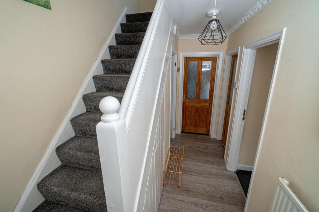 Comfortable 4-Bed Home with Free Parking - View 2