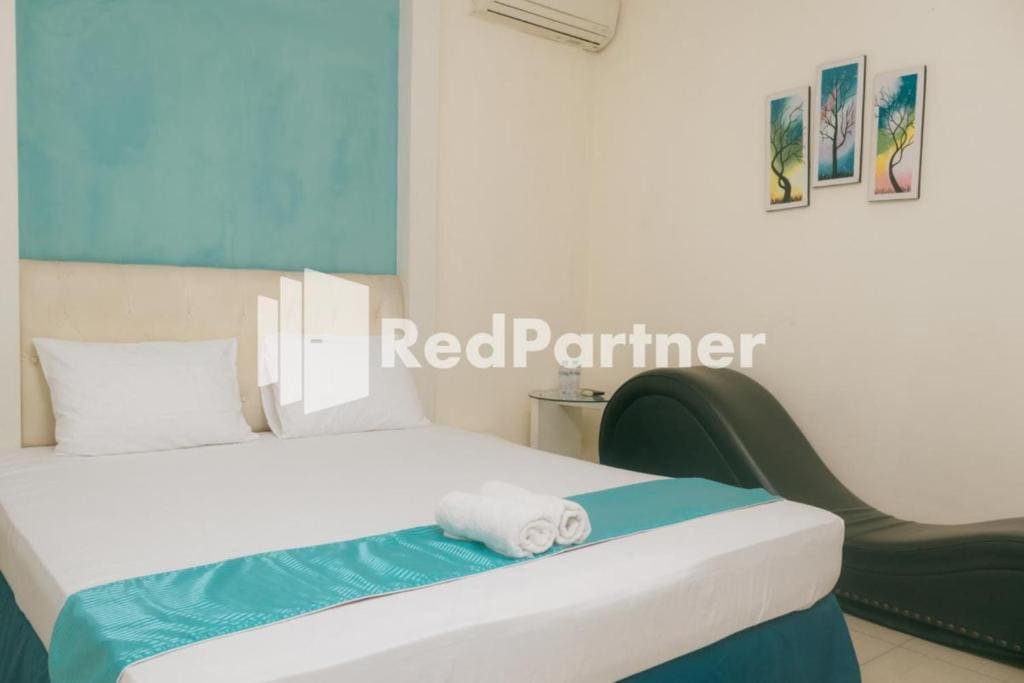Pits Hotel Mitra RedDoorz near Atom Mall - View 6