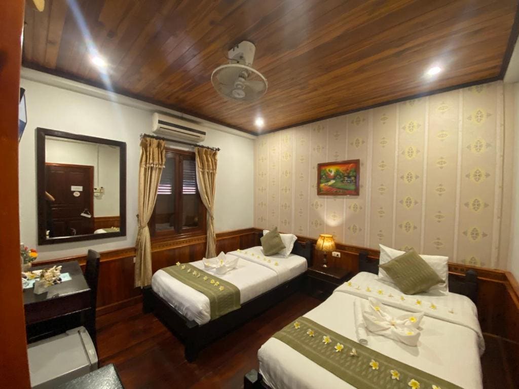 Golden Lotus Place Luang Prabang — Vue 3