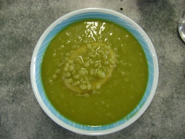 A traditional South Australian pie floater served in green pea soup.