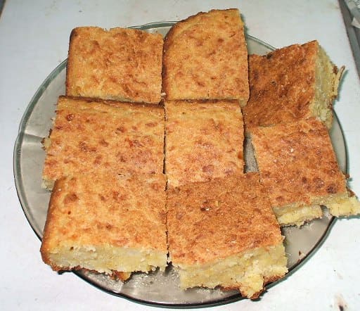 Sopa Paraguaya served fresh alongside grilled meat.