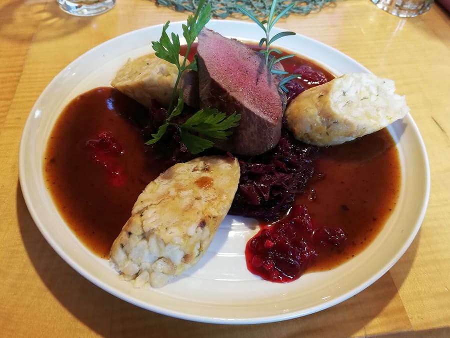 Rehrücken (saddle of venison) served with hand-scraped Spätzle and cranberries.