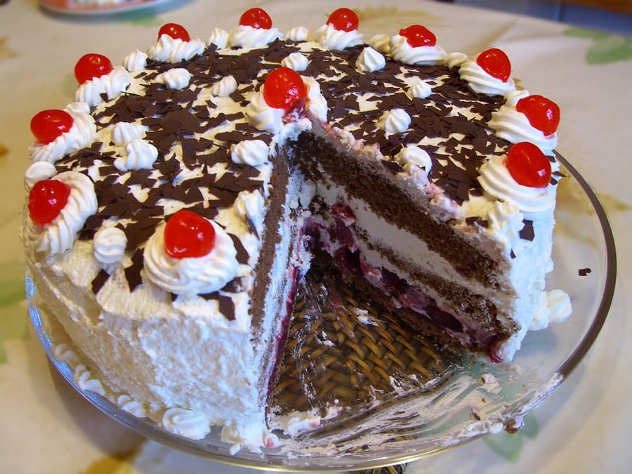 Traditional Schwarzwälder Kirschtorte with genuine Schwarzwälder Kirschwasser cherry schnapps.
