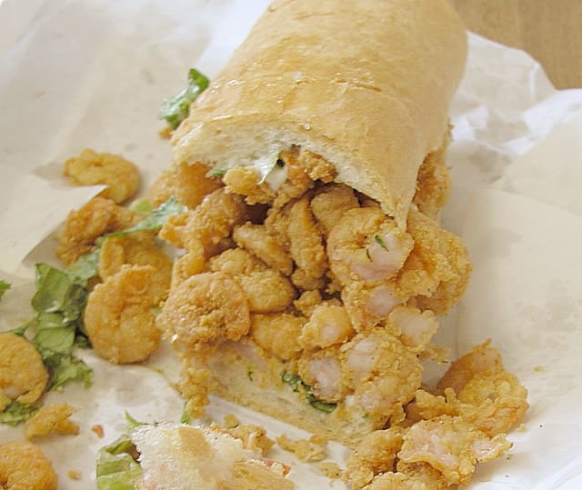 A classic fried shrimp po' boy pressed on local crisp French bread.