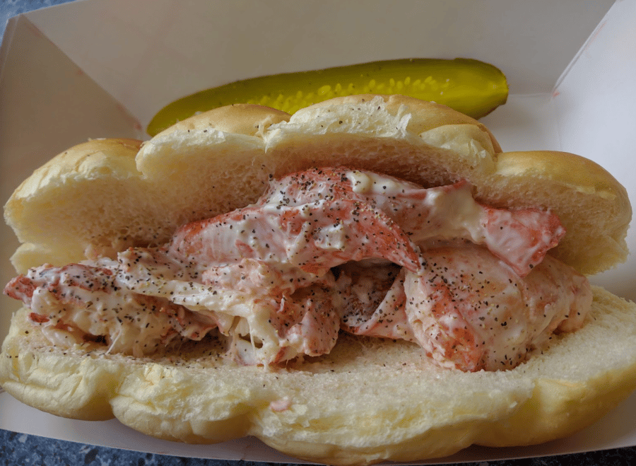 Chilled lobster salad served inside a split-top buttered roll.