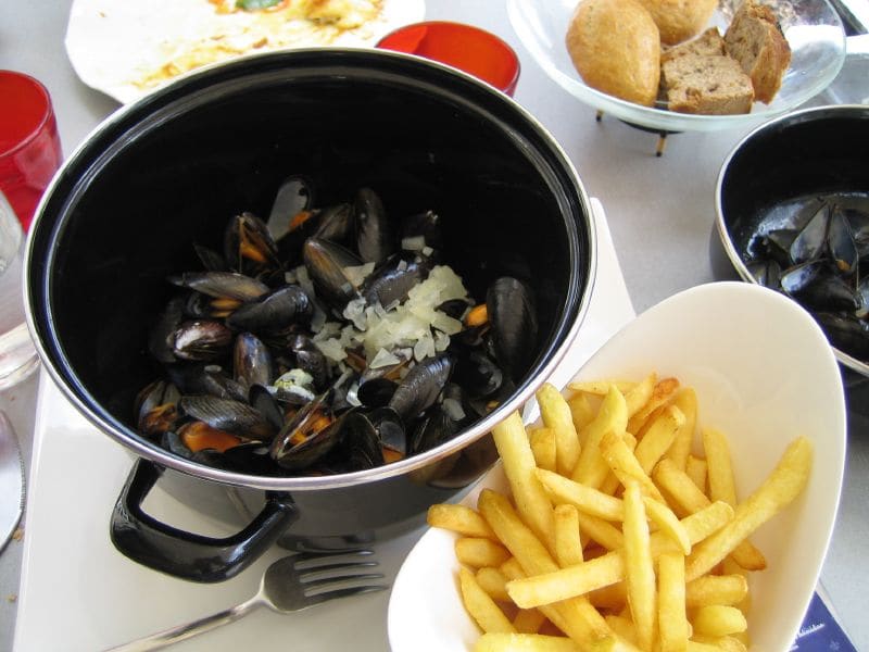 Frites served traditionally in a paper cone with mayonnaise.