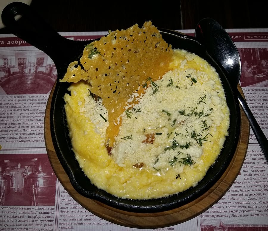 Freshly stirred cornmeal banosh topped with sheep bryndza cheese and cracklings.