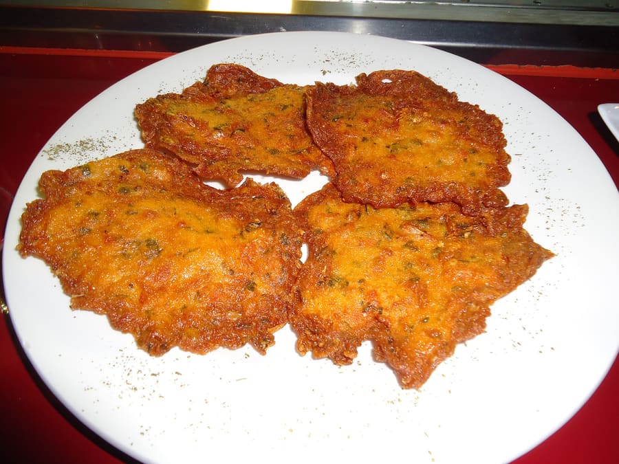 Crispy tortillitas de camarones cooked fresh at a local freiduría.
