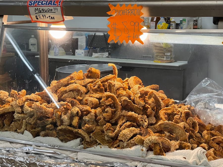 Freshly sliced chicharrones de Chiclana seasoned with sea salt and lemon juice.