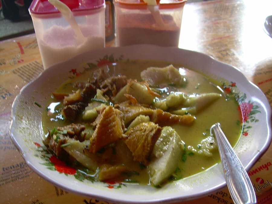 Empal gentong simmered slowly in traditional clay pots.
