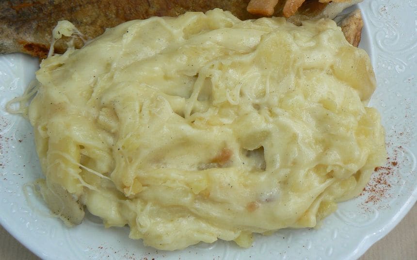 A pan of traditional Auvergne truffade served with local cured ham.