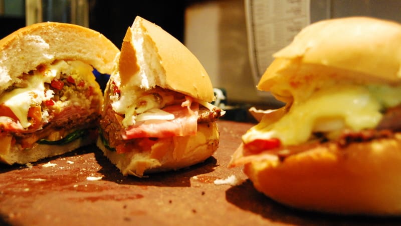 A full chivito al plato served with fries and ensalada rusa in Colonia.
