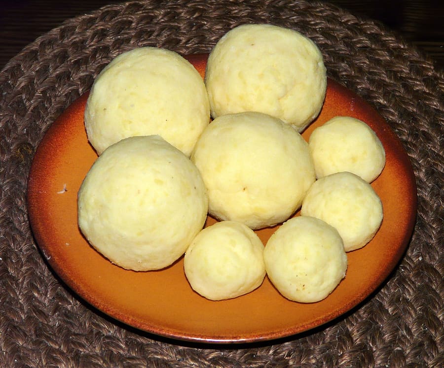 Tyrolean Knödel served in hot beef broth at an alpine hut.