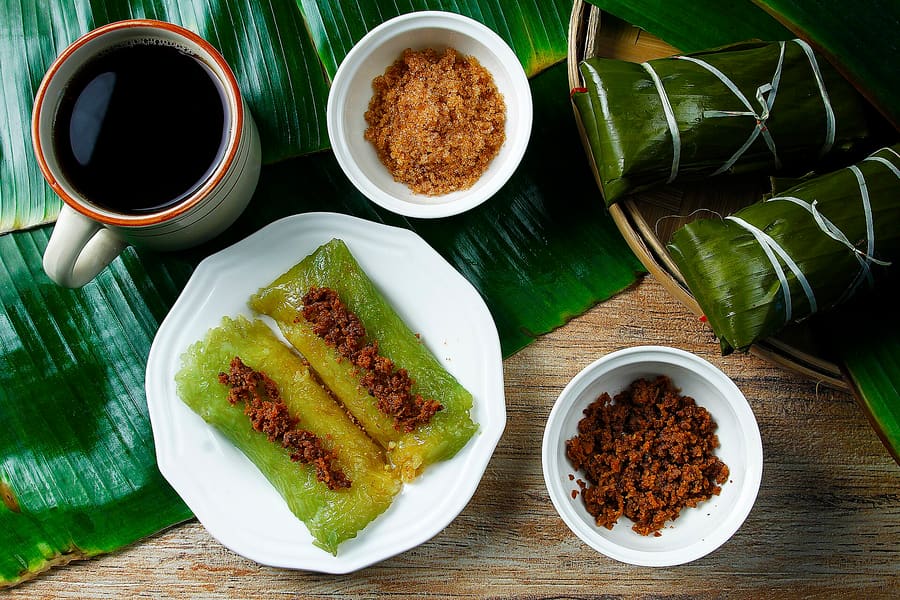 Budbud kabog served with thick hot cacao chocolate at the public market.
