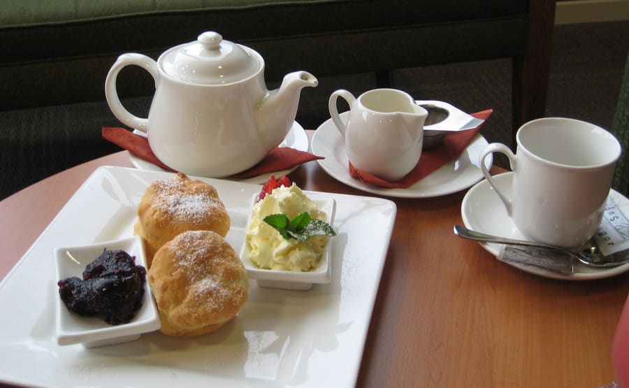 Devon cream tea in Exeter strictly puts clotted cream beneath jam.