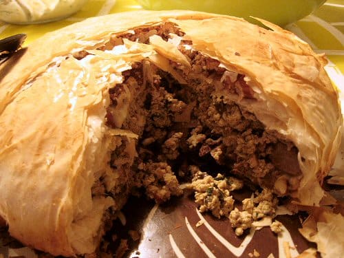 Traditional pigeon pastilla dusted with cinnamon and sugar.