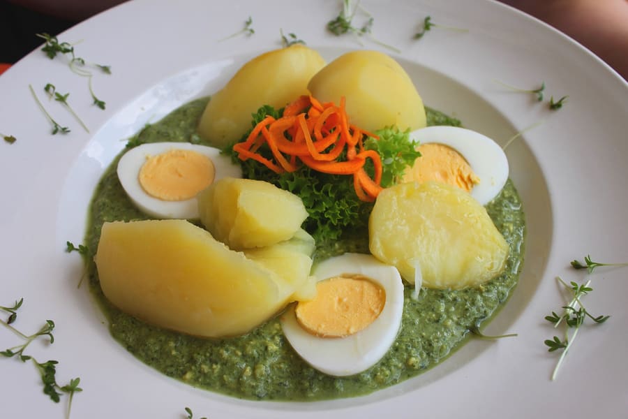 Frankfurter Grüne Soße served cold with hard-boiled eggs and boiled potatoes.