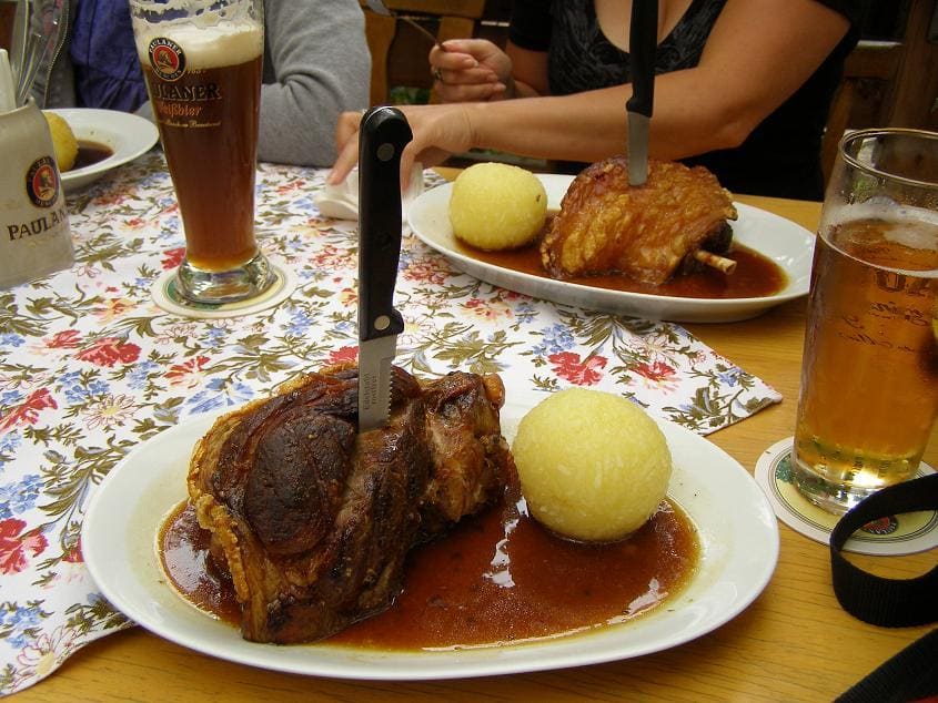 Traditional Werdenfelser Krustenbraten served with potato dumplings.