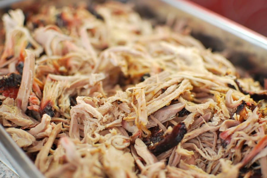 Lexington-style hickory-smoked barbecue pork shoulder with red slaw.