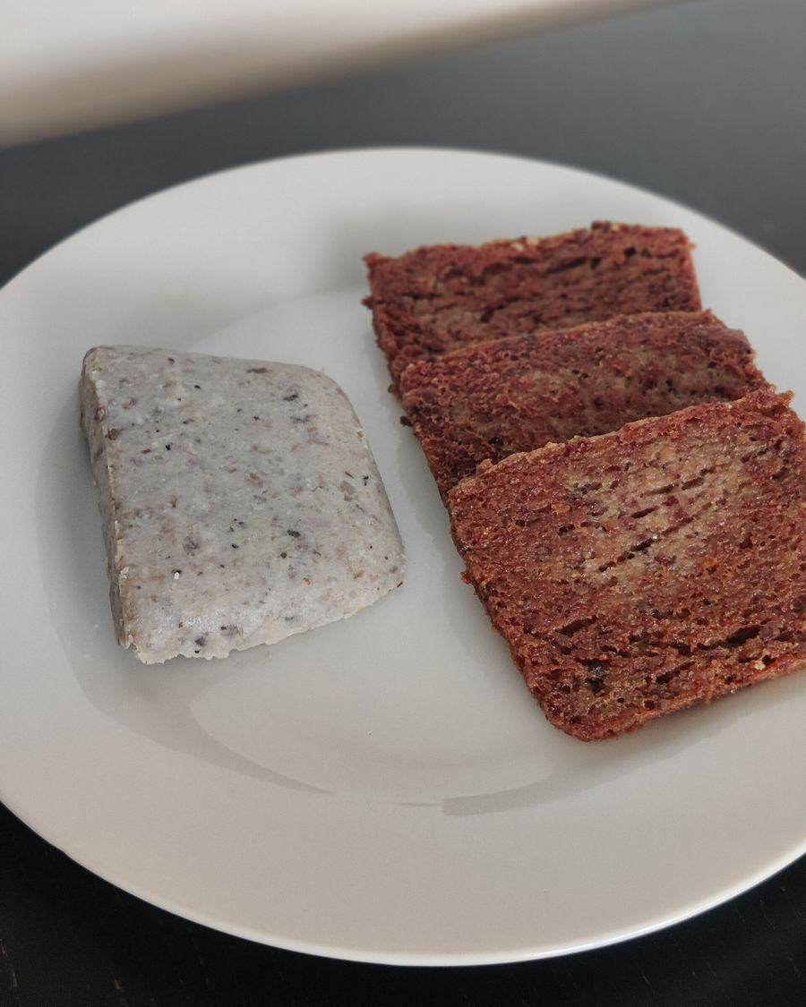 Scrapple fried crisp on a flat-top grill.