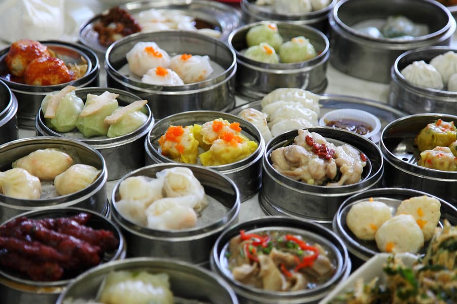 Traditional dim sum service with steamed baskets.