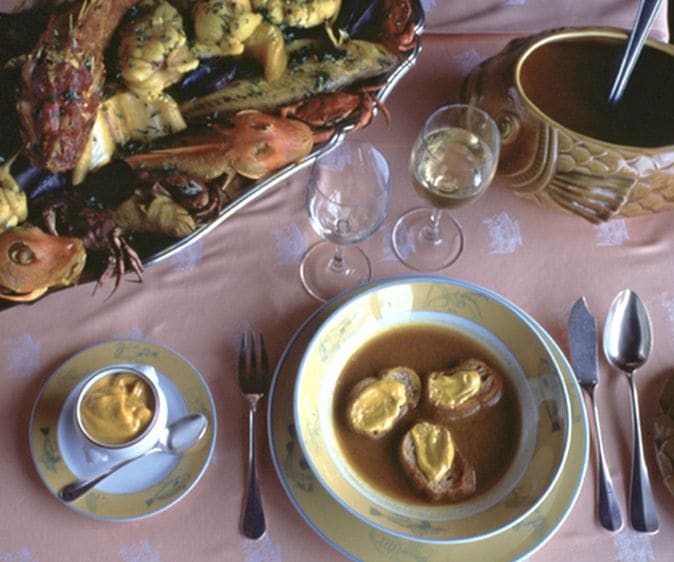 Local red mullet and seasonal vegetables served near the port.