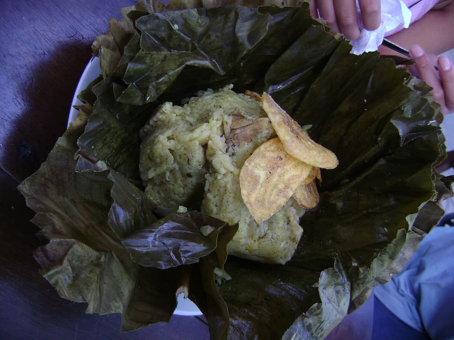 Juane: rice, chicken, and egg wrapped in bijao leaves, boiled for river travel.