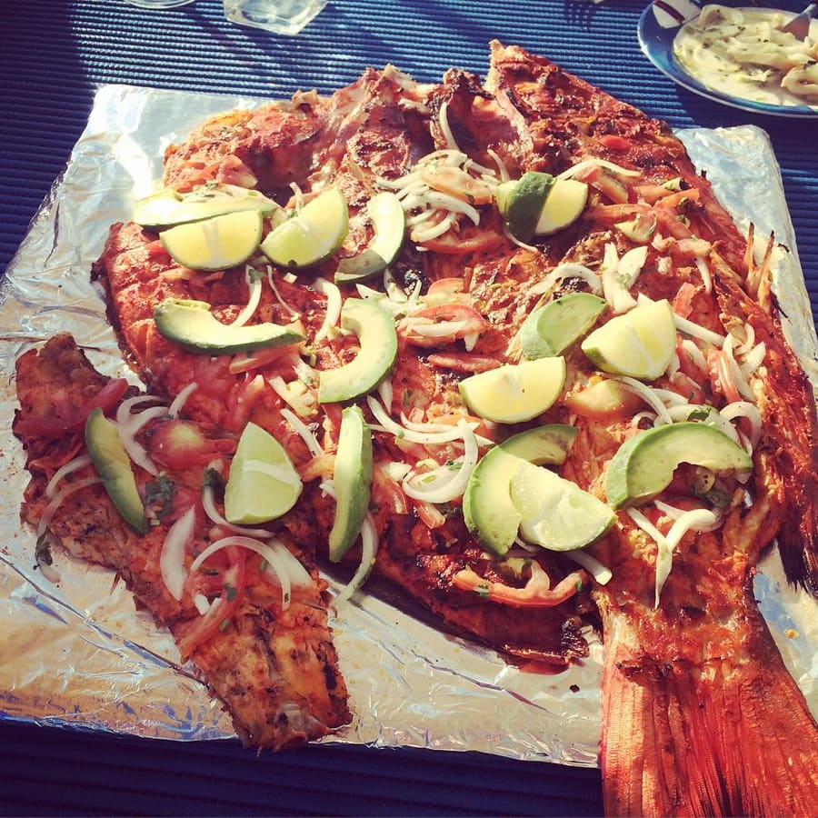 Freshly prepared Tikin Xic fish grilled with achiote paste and sour orange over charcoal.