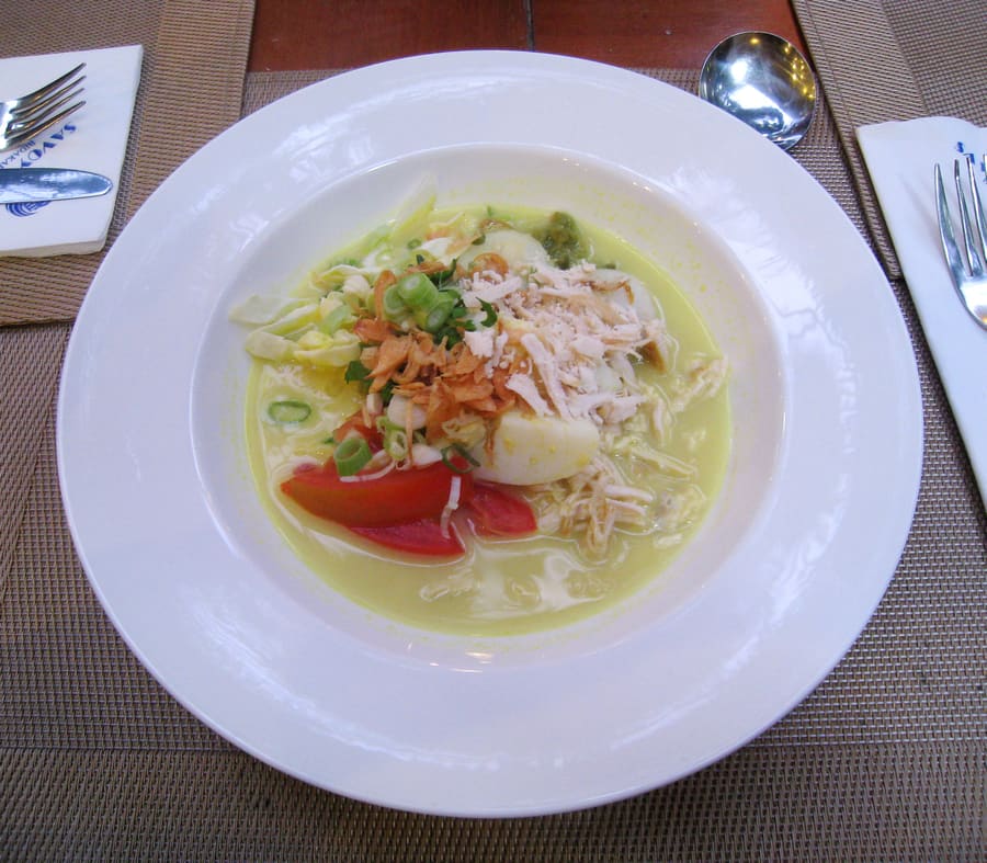 Soto Betawi combines tender beef shank in a rich coconut and cow-milk broth spiced with nutmeg.