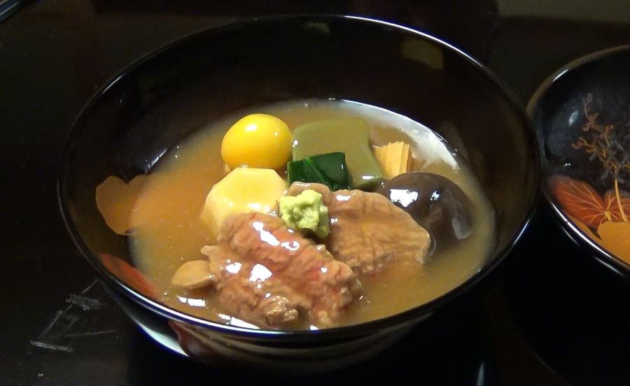 Jibu-ni, a traditional Kaga stew of flour-coated duck cooked in rich dashi stock.