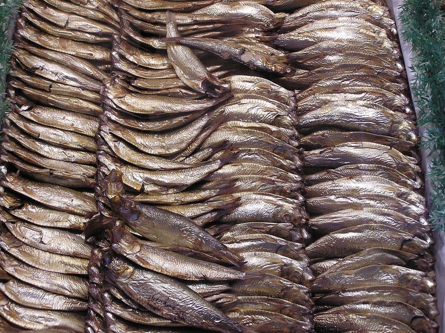 Traditional wooden box of Kieler Sprotte smoked sprats.