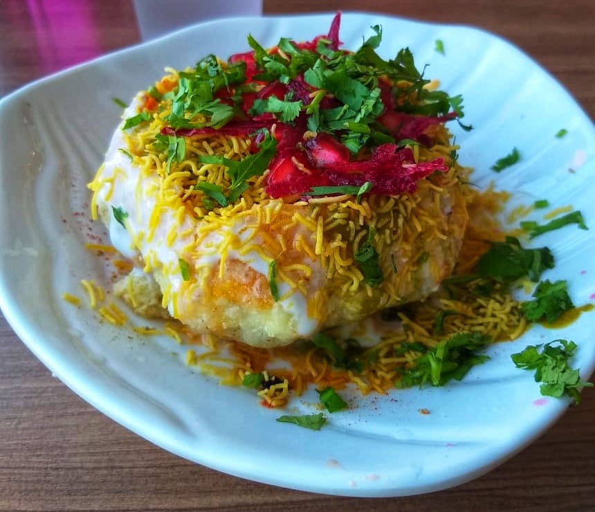 Freshly fried Kota kachori served crisp with spicy green chutney.