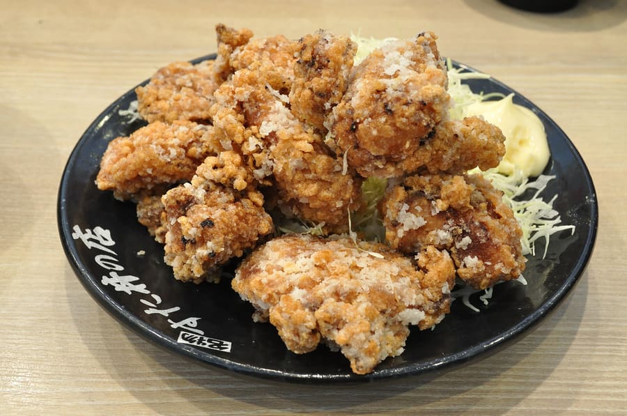 Crispy Kushiro Zangi, seasoned with soy, garlic, and Worcestershire-based sauce.