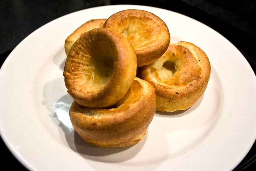 A Yorkshire pudding served with roast beef and rich gravy.
