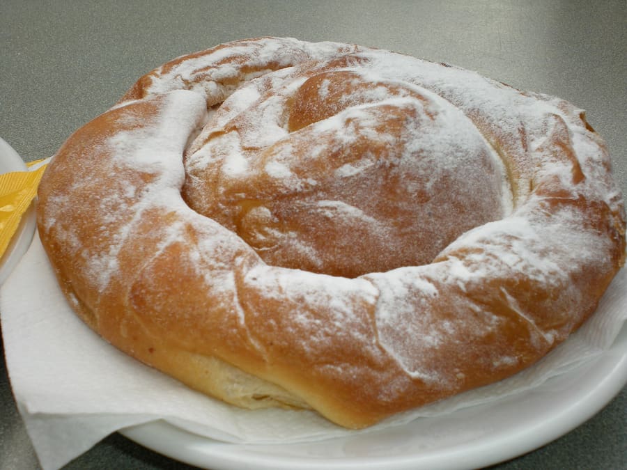 A traditional dusted ensaïmada from a bakery in Palma.