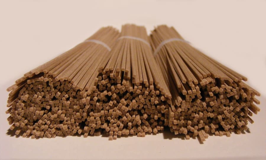 A fresh tray of Shinshu hand-cut buckwheat soba with dipping broth.