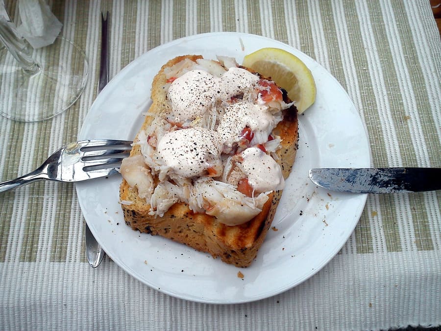 West Indies salad: marinated lump blue crab meat served cold with saltine crackers.