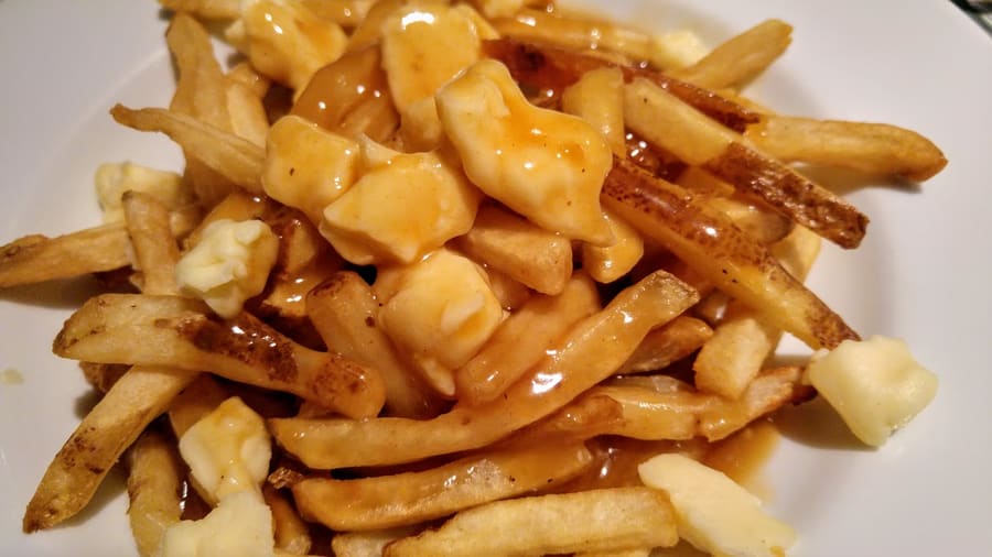 Fresh cheese curds squeak under hot gravy on local poutine.
