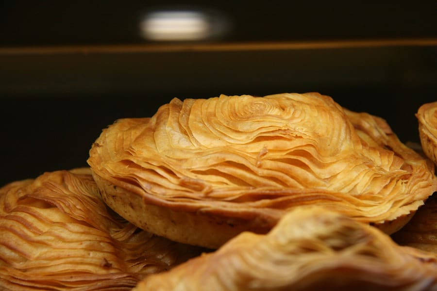 The traditional pastel de carne, encased in fine circular puff pastry.